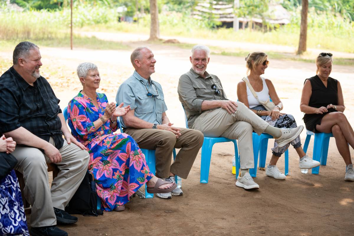 Jim and Jennifer Cowart and fellow Global Methodist church leaders sitting and talking.